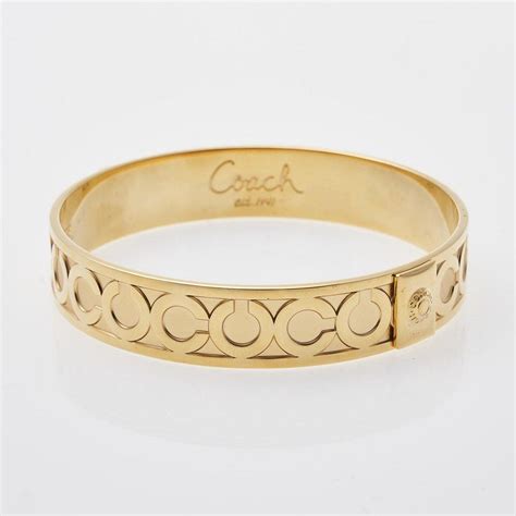 coach bracelet gold.